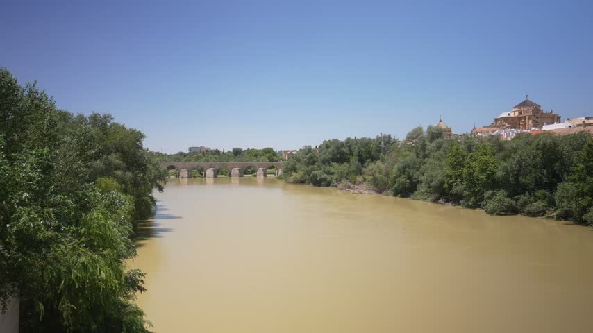 View of Roman Bridge and Cordoba skyline on a sunny day, Cordoba, Andalusia, Spain, Europe