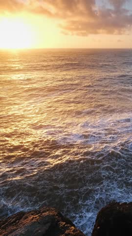 Ocean cliff rock by the sea at sunset in Cabo Carvoeiro, Peniche, Portugal