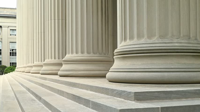 Close up video of some architectural detail of neoclassical columns.
