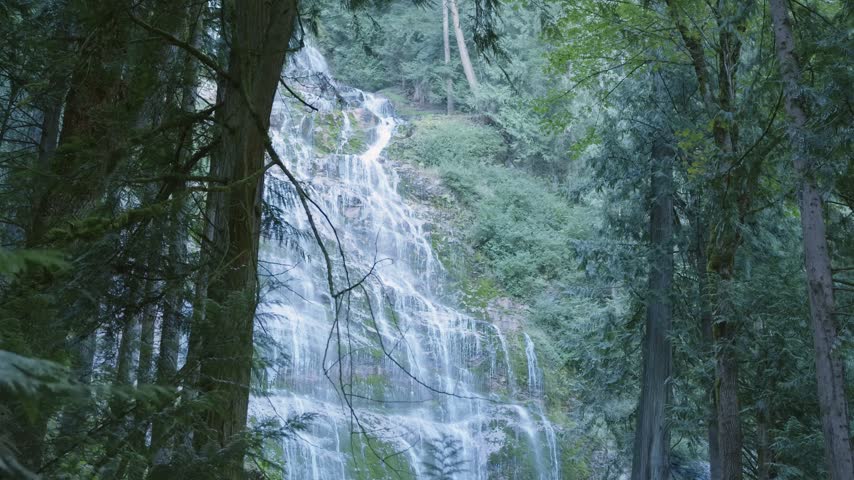 Majestic Bridal Veil Falls Cascading Through a Lush Evergreen Forest in Chilliwack, British Columbia, Canada