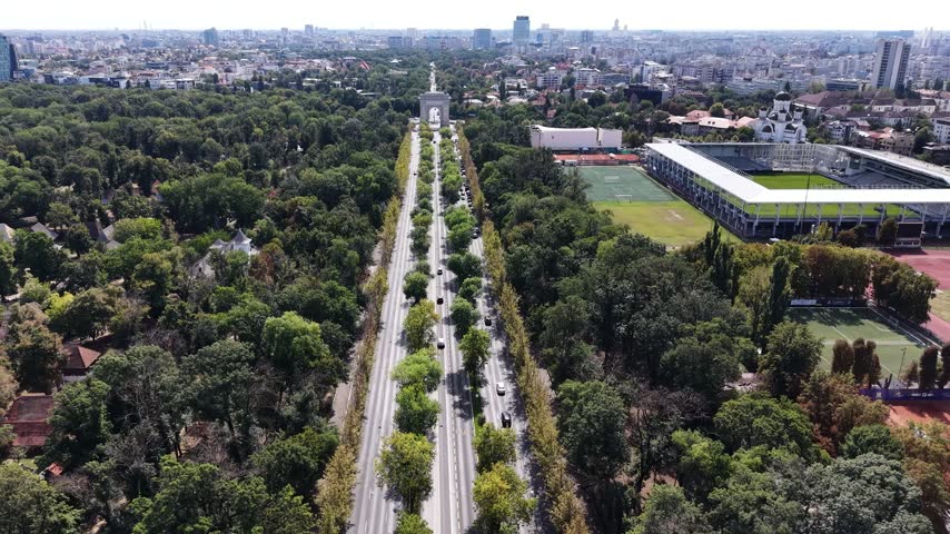 Aerial of King Michael I Boulevard and Arch of Triumph in Bucharest, Romania
