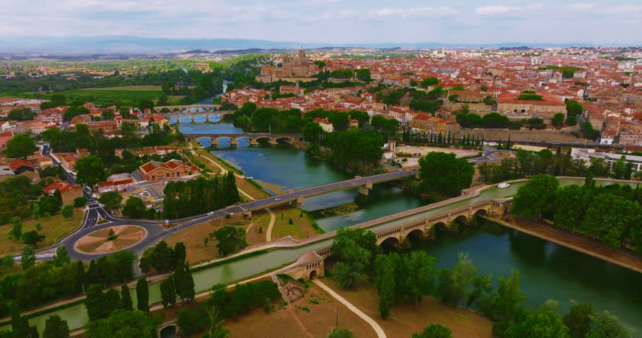 Aerial view of Beziers, charming historic city in southern France, known for the Cathedral of Saint Nazaire, the Canal du Midi, picturesque streets, traditional French architecture