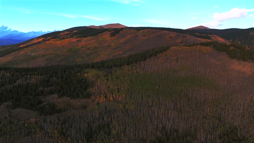 Kenosha Pass fall autumn aspen trees forest sunset golden hour Grant FairPlay Jefferson aerial drone landscape Colorado Trail Front Range Rocky Mountains Continental Divide Mount Bierstadt pan left