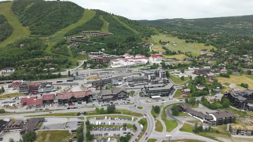 Geilo, Popular Ski Resort Town In Hallingdal, Norway, Surrounded By Mountain Scenery. Aerial Pullback Shot