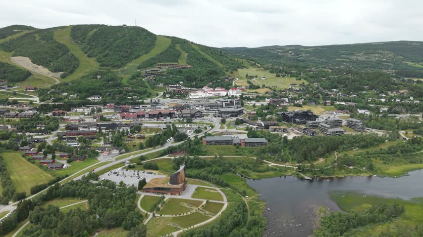 Panoramic View Of Geilo Kulturkyrkje Stands In The Ski Resort Town Of Geilo, Norway. Aerial Shot
