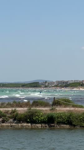 Man is surfing and riding the waves in summer.
