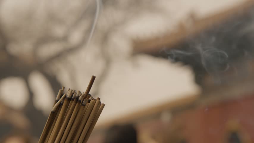 Incense Sticks Burning in Courtyard at Lama Temple, Beijing with People Nearby