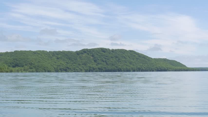Lake and green hills blue sky, Hokkaido Japan