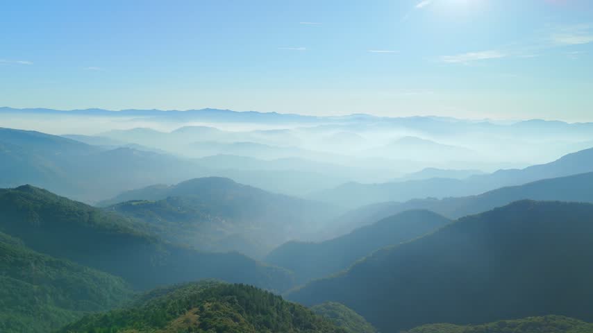 Italy Morning Aerial – Backward Drone Descent Over Foggy Hills