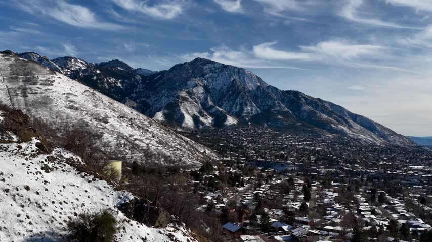 Aerial drone push-in shot of Mount Olympus and the Olympus Cove neighborhood