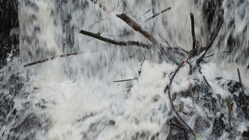 Closeup of a Rapid Waterfall with Rushing White Water
