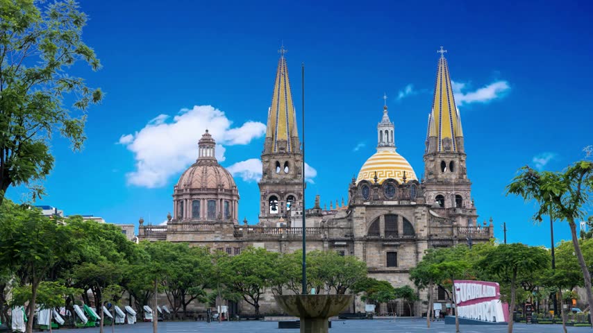 GUADALAJARA, MEXICO  Fountain in front of Main Cathedral. Gudalajara is the capital and largest city of the Mexican state of Jalisco, and the seat of the municipality of GuadalajaraFountain on The Plaza de Armas day to night transition timelapse, also known as the Plaza Mayor, sits at the heart of Lima