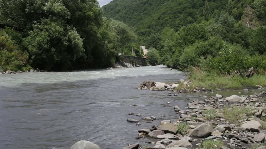 Scenic view of the famous unique confluence where tetri white and black aragvi mountain rivers meet in georgia for travel blog video content or geography educational infographic layout or relax.