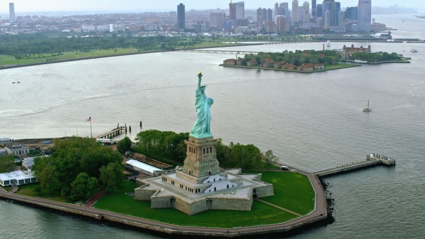 Aerial View of the Statue of Liberty on Liberty Island in New York Harbor, USA, Showcasing the Iconic American Monument and Its Historic Significance as a Symbol of Freedom and Independence.