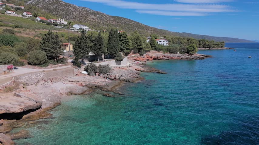 Aerial View of Coastal Village, Beaches and Turquoise Sea on Hvar, Croatia
