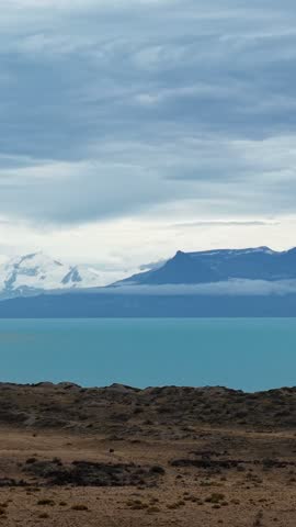 Glacial Lake and Snow-Capped Mountains