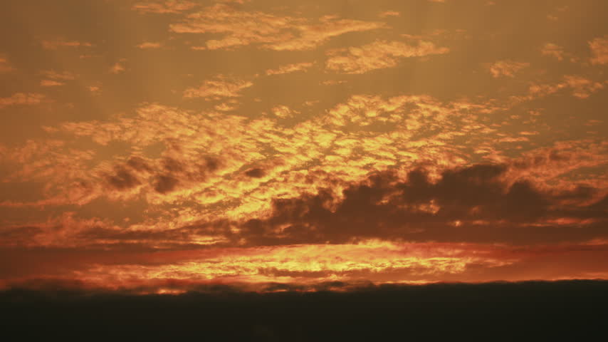Sunset over the Pacific Ocean on clear cold day 