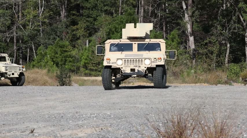 U.S. soldiers conduct combat vehicle driver training, navigating through obstacles at Fort Stewart, Georgia, on October 23, 2026.