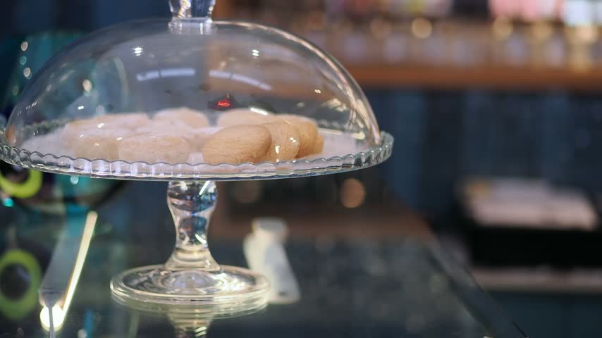 Assorted Cookies on a Glass Stand in a Cafe