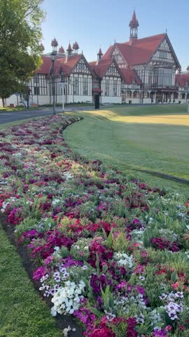 Flower beds leading to the historic Bath House, Rotorua, NZ