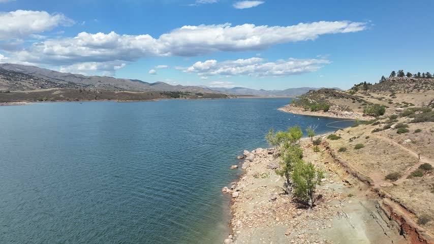 Horsetooth Reservoir Fort Collins Colorado lake with puffy clouds.