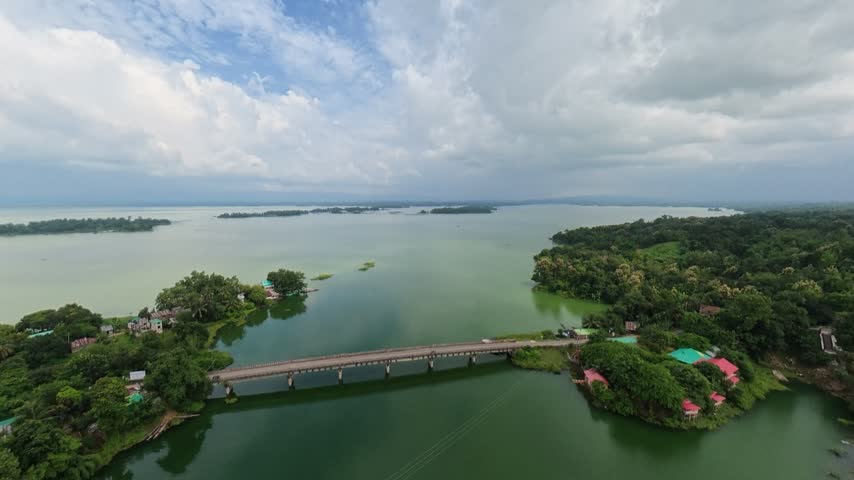 Cinematic Drone Flyover Above Kaptai Lake Water Body and Green Landscape