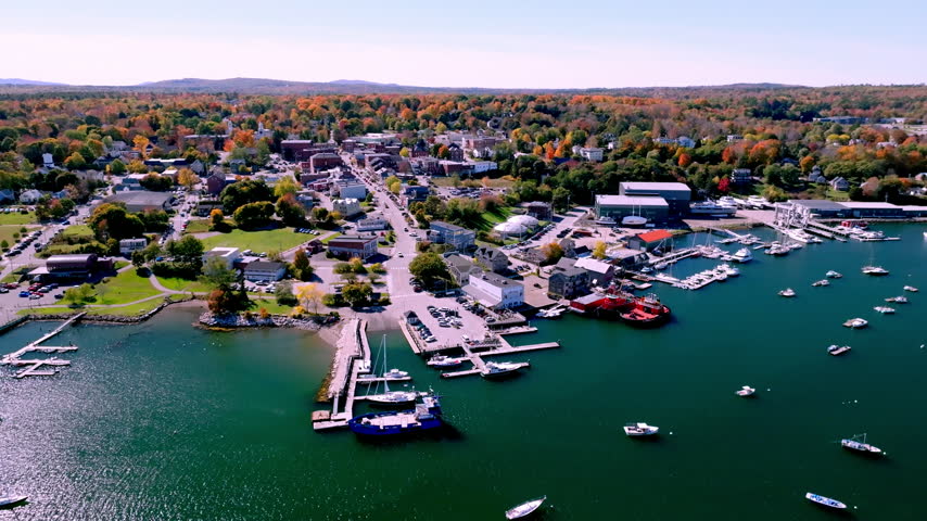 Downtown Belfast, Maine behind its harbor, shipyard and moorings on Penobscot Bay