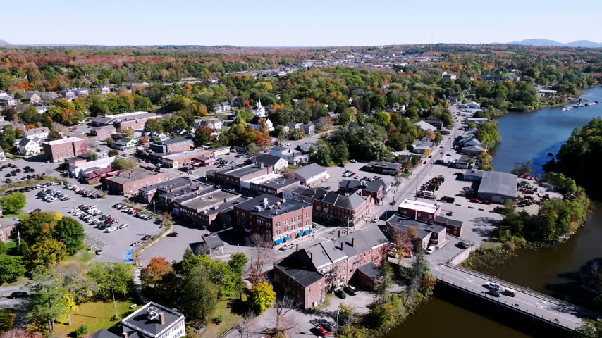 Rooftops of downtown Ellsworth, Maine with brick Main Street and church steeple