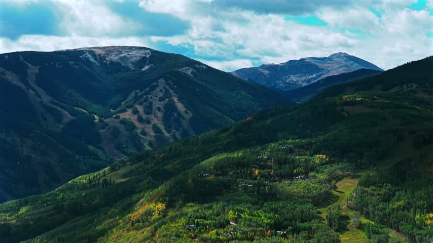 Aerial drone view of Beaver Creek Ski Resort ski trails lift lodge base sunny blue sky morning Fall Autumn Notch Mountain Bachelor Gulch Vail Avon Edwards Colorado landscape Eagle County circle left