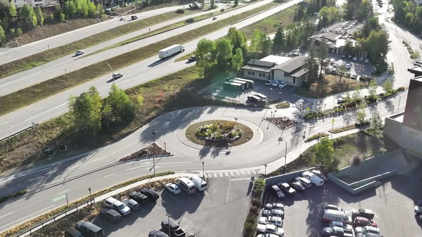 I70 and traffic in Vail Colorado with a view of a roundabout near the village.