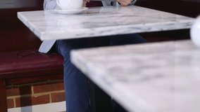 Man sitting in coffee shop