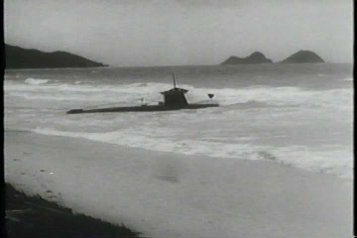1940s - Pearl Harbor is left in ruins after the surprise attack by the Japanese during the 1940s