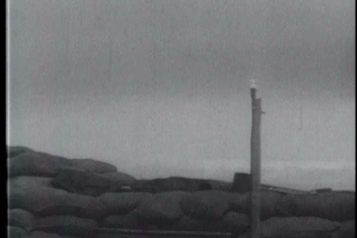 1950s - Allied forces use anti-aircraft artillery to protect Antwerp, Belgium from a Nazi air-raid during World War 2