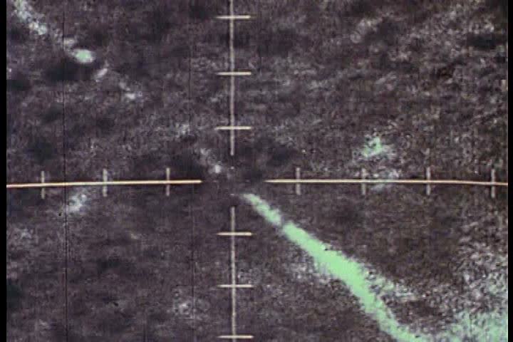 1960s - A silent film of Air Force personnel flying planes and analyzing data in Vietnam