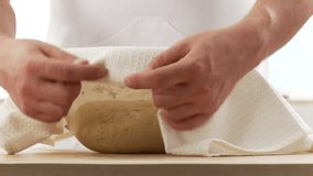 Yeast dough being covered with a cloth - Powered by Shutterstock - Get 15% off with code: PIKWIZARD15