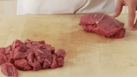 Shoulder of beef being sliced and diced