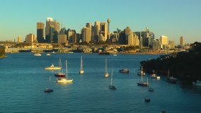 Time-lapse video of Sydney city skyline at late afternoon with rapid change of light
