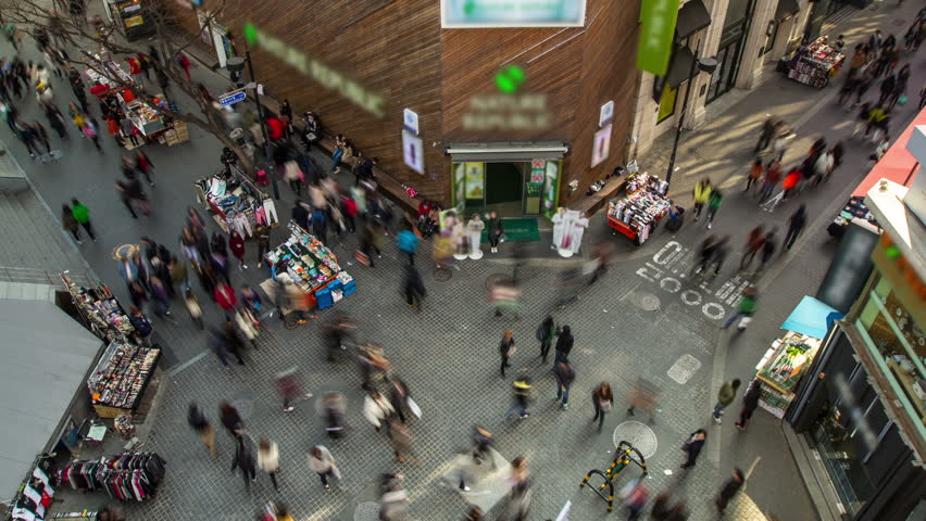 Seoul City Myeong-dong Crowded Shopping
193) Time lapse of people and traffic in a very crowded packed shopping area.