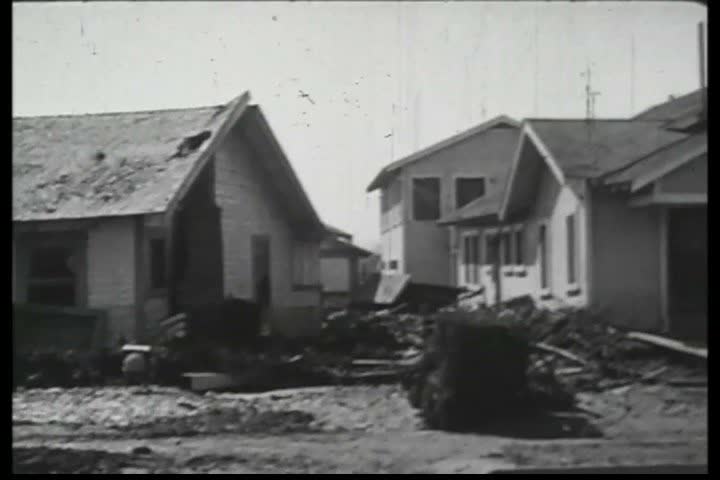 1920s - A town is left in ruins after a flood runs through it during the 1920s