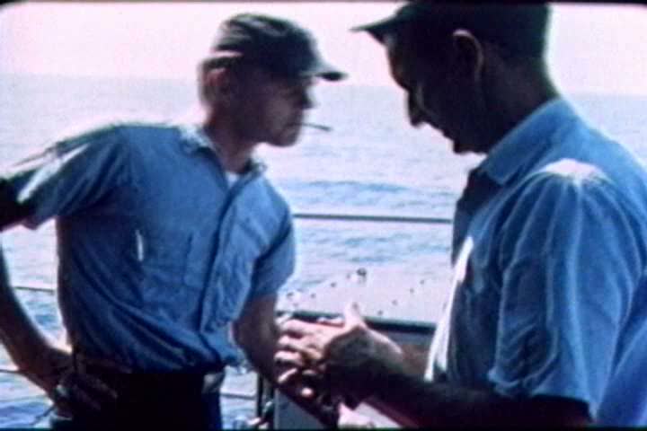 1960s - Naval crewmen work onboard their ship during the 1960s