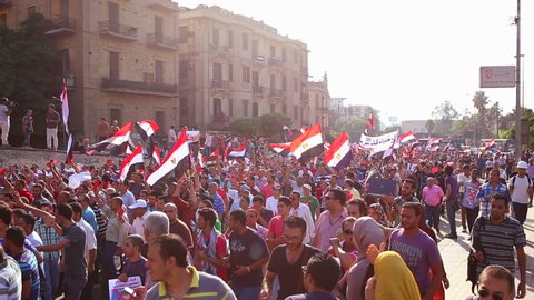 CAIRO, EGYPT - 2013: Protestors march in Cairo, Egypt following the coup that removed Morsi from office.
