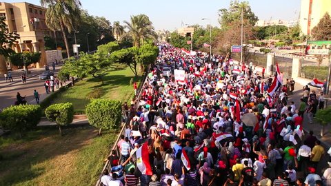 CAIRO, EGYPT - 2013: A large protest march in Cairo, Egypt, following the ouster of Morsi.