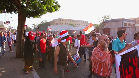CAIRO, EGYPT - 2013: Protestors march and chant in Cairo, Egypt.