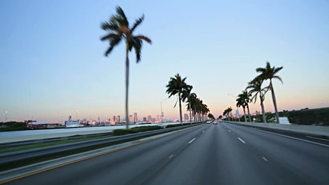 Point of view driving on MacArthur Causeway towards Miami downtown, Florida, USA