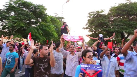 CAIRO, EGYPT - CIRCA JULY 2013: Protestors march and chant in Cairo, Egypt, following the ouster of Morsi.