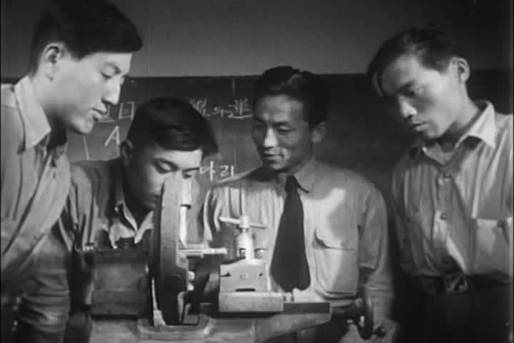 1950s - Three Korean men finish their basic naval training and go on to receive specialized training during the 1950s