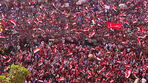 CAIRO, EGYPT - CIRCA JULY 2013: Protestors jam Tahrir Square in Cairo, Egypt following the coup that removed Morsi from office.