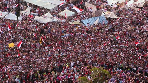 CAIRO, EGYPT - 2013: Protestors flood Tahrir Square in Cairo, Egypt following the ouster of Morsi.