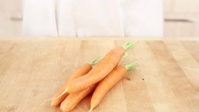 Carrots being peeled