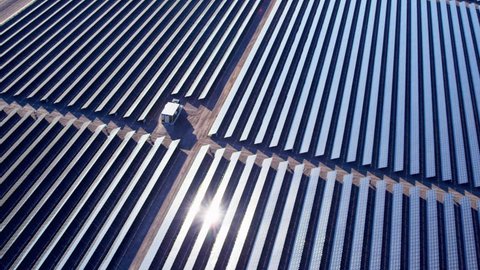 Aerial industrial view Photovoltaic solar units desert environment producing renewable energy, USA